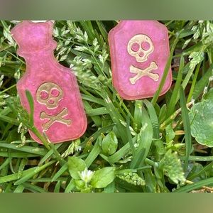 Handmade pink resin poison vial earrings